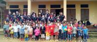 Students and local children in remote school in Vietnam