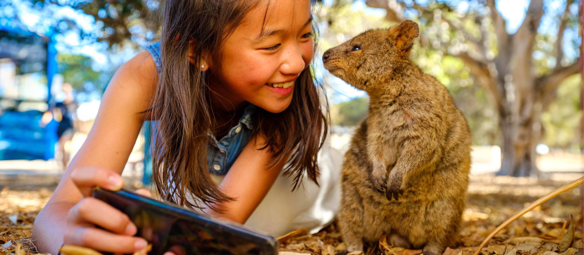 A student taking a selfie with one of the local Quokka's Rottnest Island | Tourism Western Australia