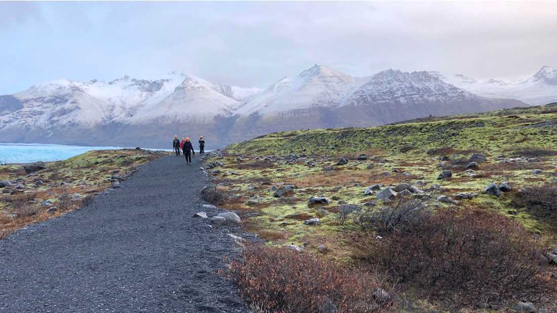 hikers returning from glacier walk on skaftafellsjökull |  Kate Baker