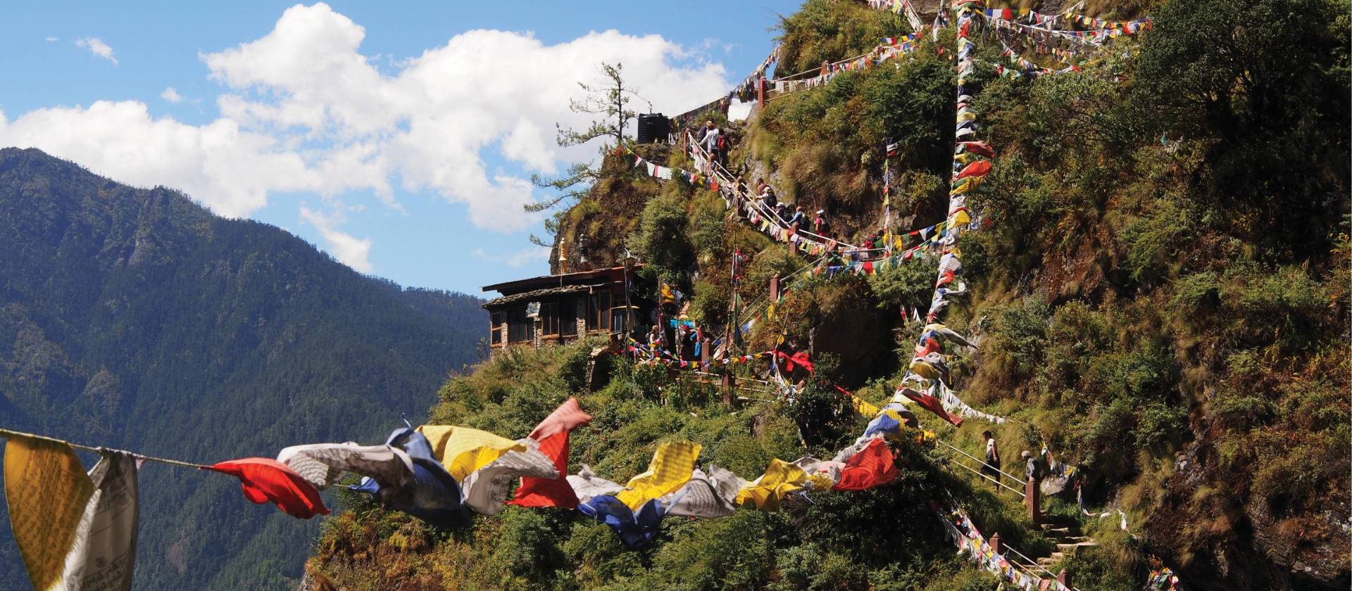 Prayer flags and mountain views, Bhutan | Scott Pinnegar
