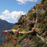 Prayer flags and mountain views, Bhutan | Scott Pinnegar