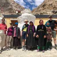 Trekkers pose with locals from Skiu village in Ladakh | Brad Atwal