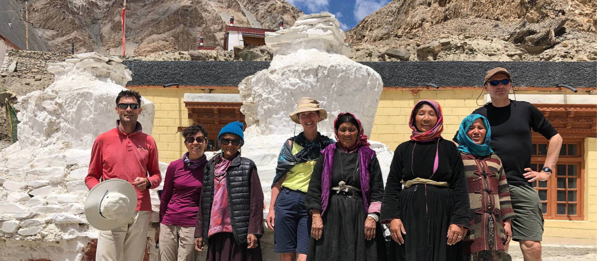 Trekkers pose with locals from Skiu village in Ladakh | Brad Atwal