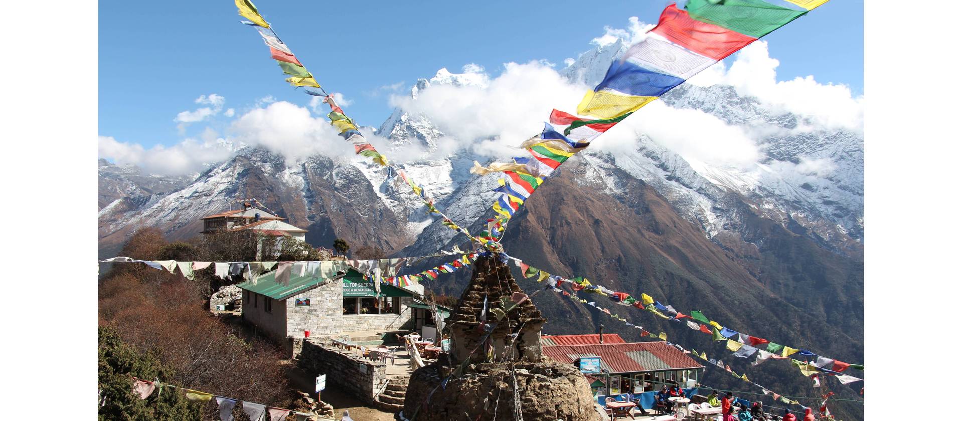 Prayer flags blow in the wind | Ayla Rowe
