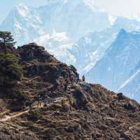 The trail to Thyangboche winds past the face of Ama Dablam | Mark Tipple