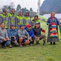 Our crew and the caretaker of our Ghat Eco-Comfort Camp | Andrew Bain