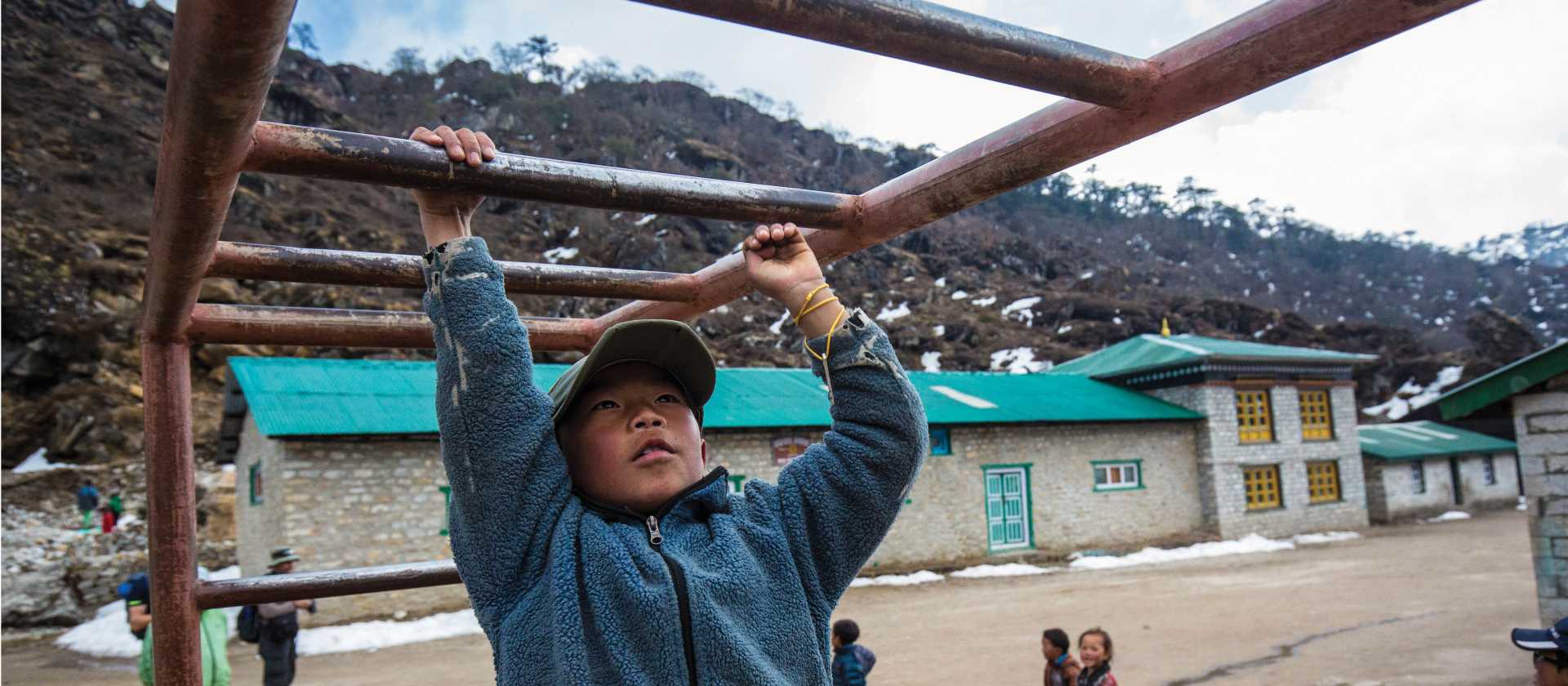 Local child shows off his skills on the monkey bars | Mark Tipple
