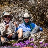 Trekkers taking a drink break on trek. | Lachlan Gardiner