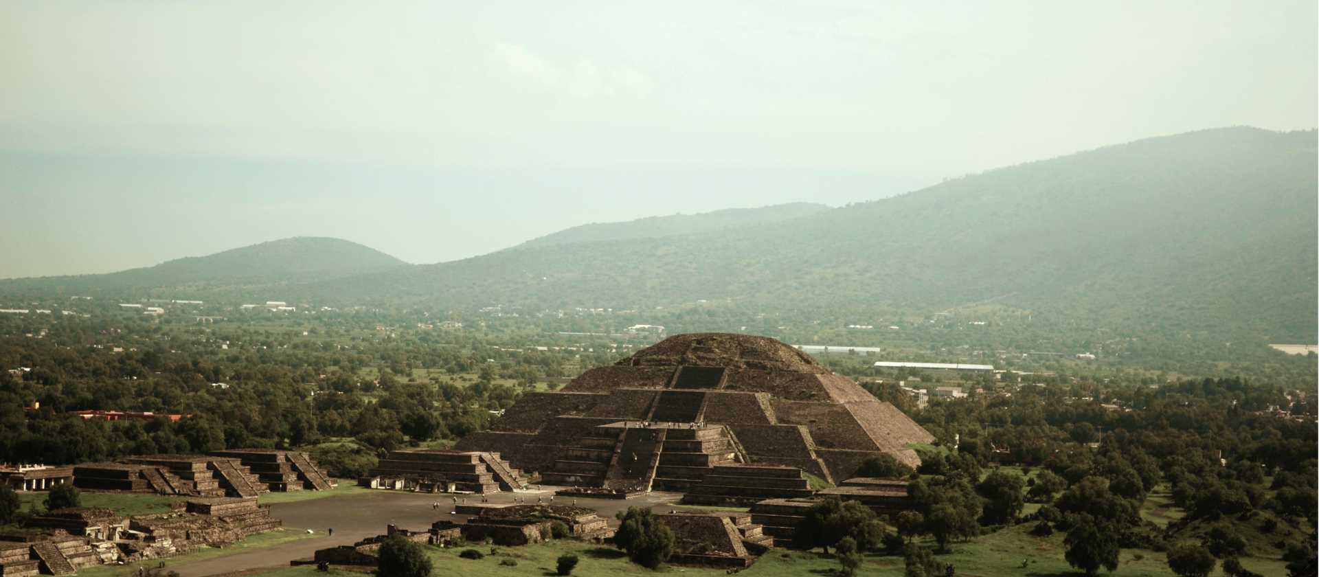 The Teotihuacan Pyramids site is known for its beautiful murals, extensive residential complexes, and the Avenue of the Dead,