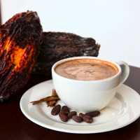 Enjoying a warm chocolatey drink after the cacao sharing ceremony