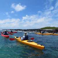 Sea kayaking through the pristine waters of Divine Bay in Galapagos.