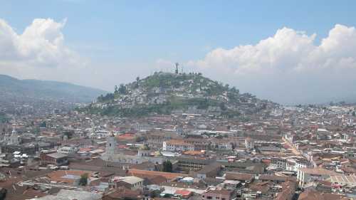 The incredible view of El Panecillo Hill over the expanse of Quito city.