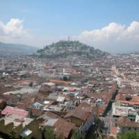 The incredible view of El Panecillo Hill over the expanse of Quito city.