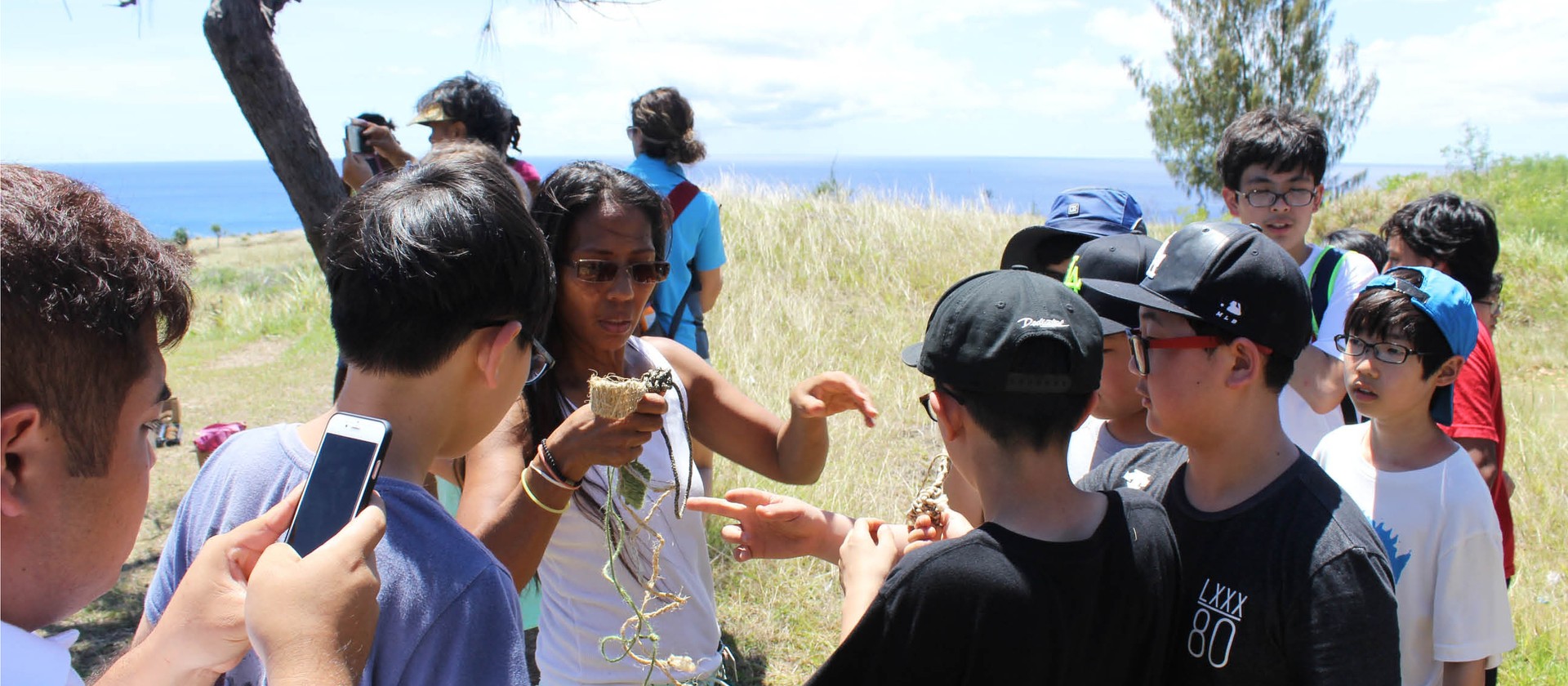 Preparing to sling the 'seedstones' as part of the Service Project at Fort Soledad, Umatec.