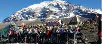 Breakfast under a clear blue sky and under the watchful eye of the Mountain, Karanga Camp | Eva Moons