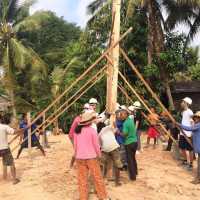 Student's assisting with building a house for a local family in need