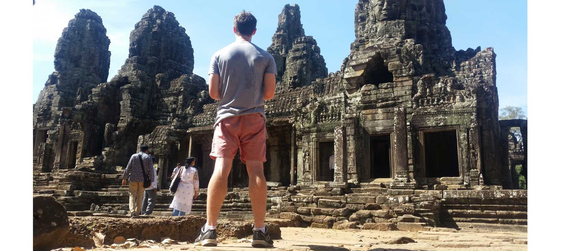 Student appreciating the ruins of Angkor Wat in Cambodia | Zach White