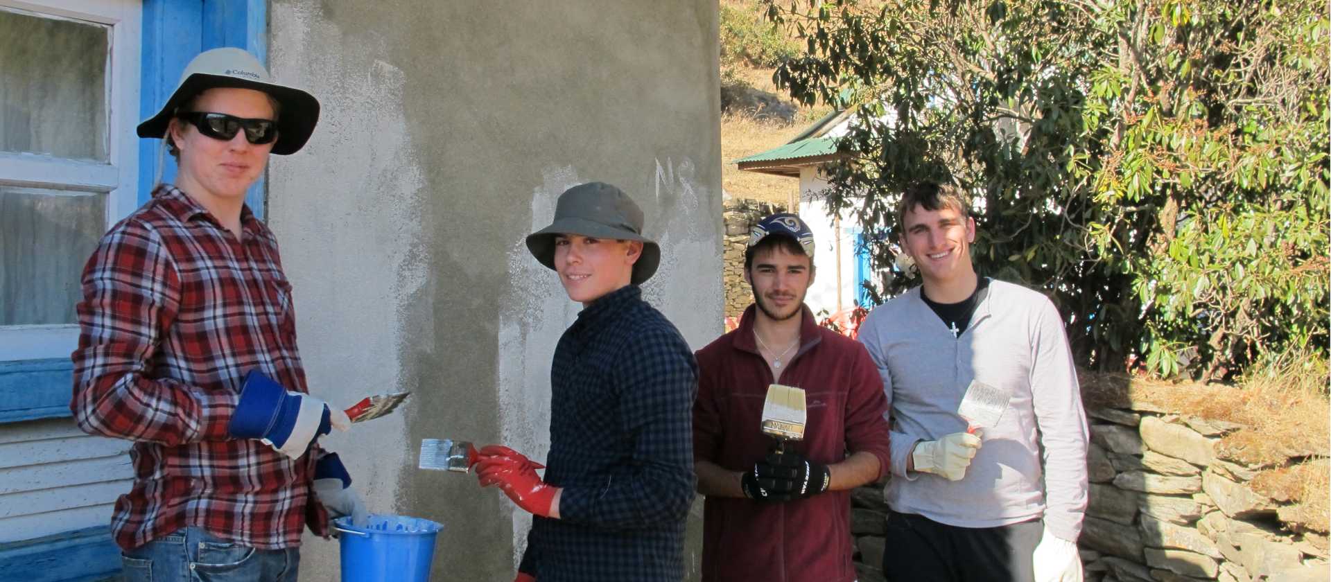 Painting at a community project in Nepal | Greg Pike