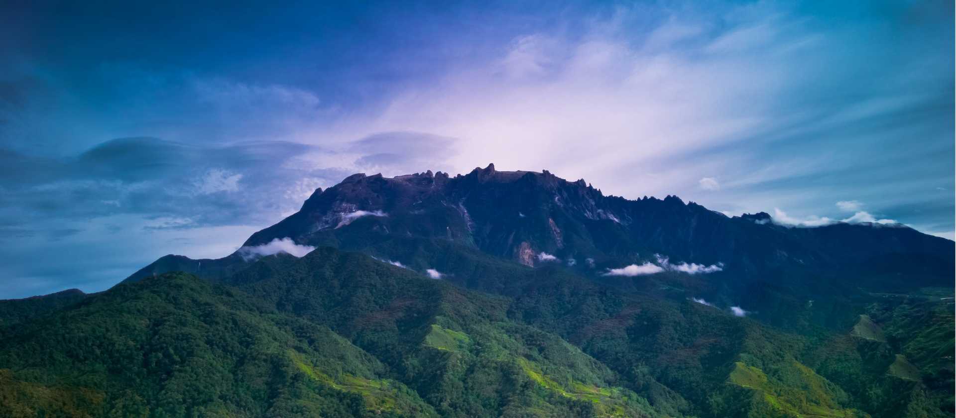 Spot glimpses of Mount Kinabalu as you travel overland in Sabah | Ryan O'Niel