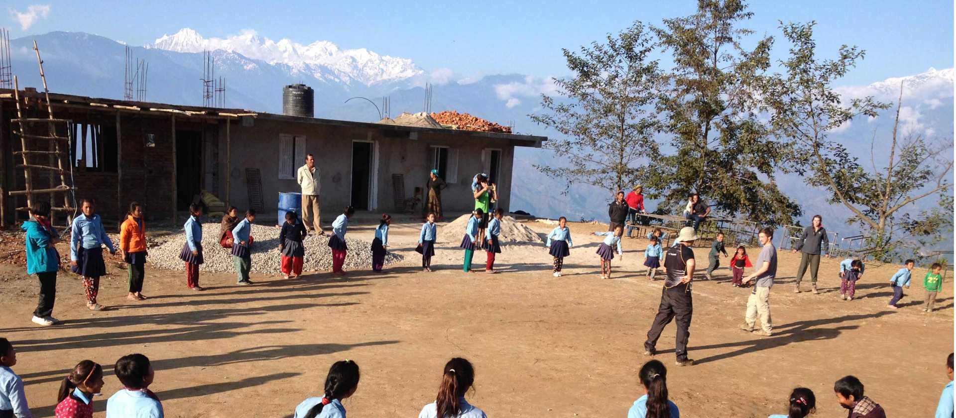 Playing with the local school children at the project site