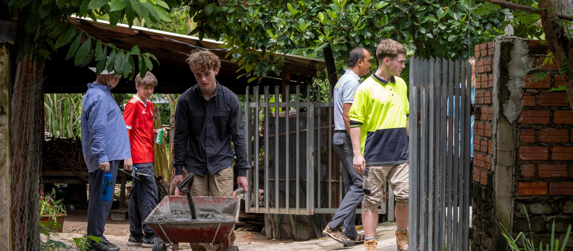 Students create bricks from plastic, and help build, during a service learning program | Jordan Curzon