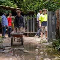 Students create bricks from plastic, and help build, during a service learning program | Jordan Curzon