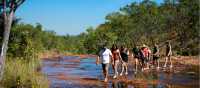 Students hiking in Kakadu National Park | Tourism NT/Shaana McNaught