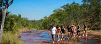 Students hiking in Kakadu National Park | Tourism NT/Shaana McNaught