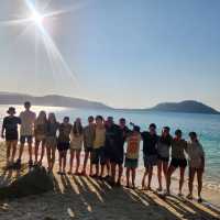 Students on the beach teamwork