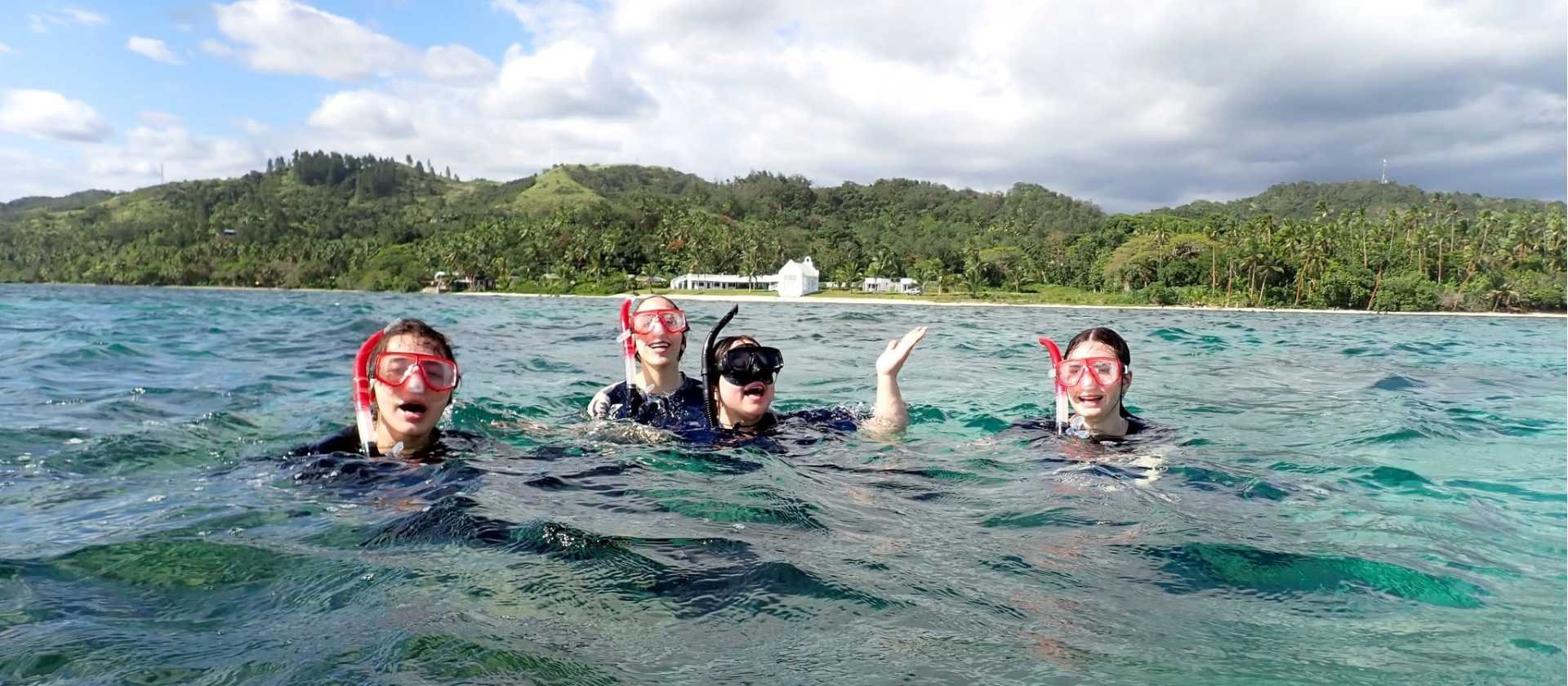 Students snorkeling in Fiji