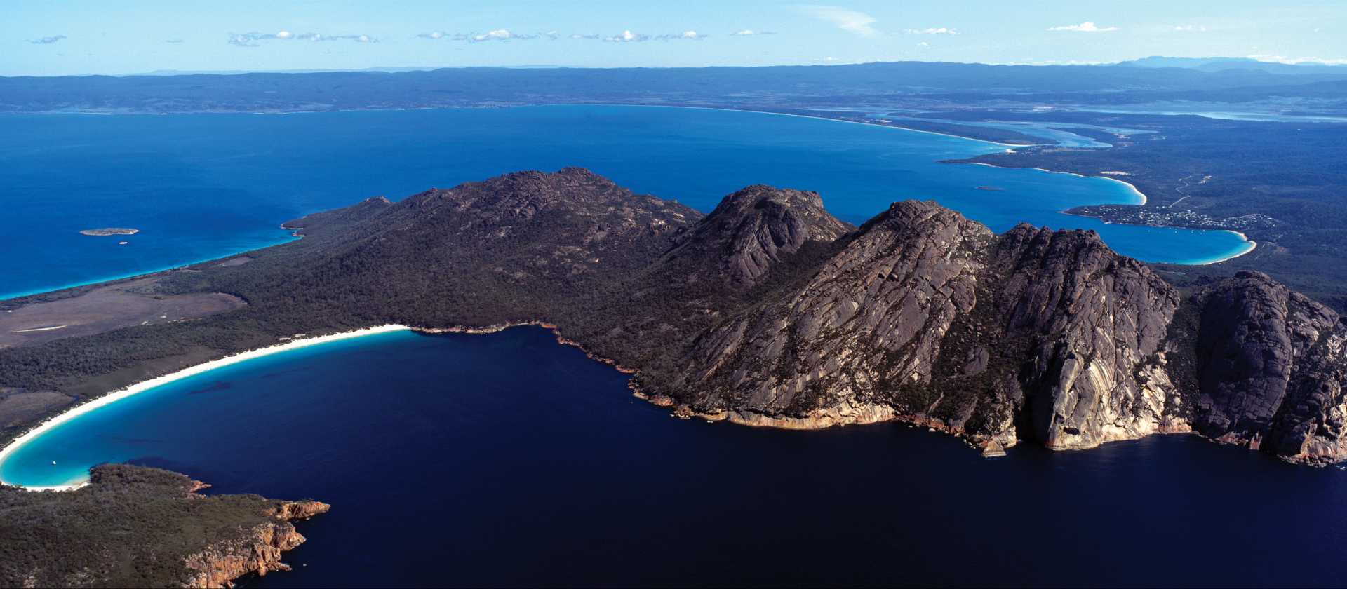 Trek to lookouts to get stunning views of Wineglass Bay and the Hazards | Tourism Tasmania & Peter Bellingham
