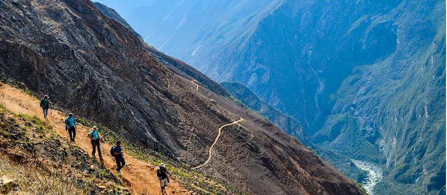 Hiking the Inca Trail with stunning views of the mountains all around