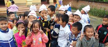 Happy school kids as we pass through Ham Yen | Scott Pinnegar