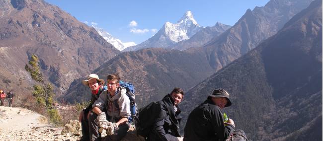 Resting during a school trek in Nepal | Greg Pike