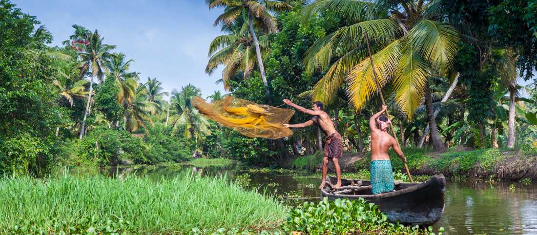 Villagers fishing in the backwaters near Kerala | Richard I'Anson