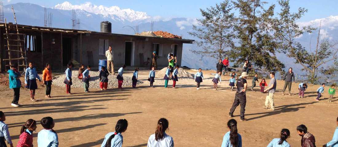 Playing with the local school children at the project site